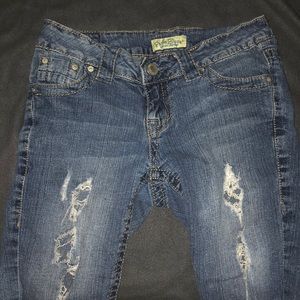Destroyed denim shorts